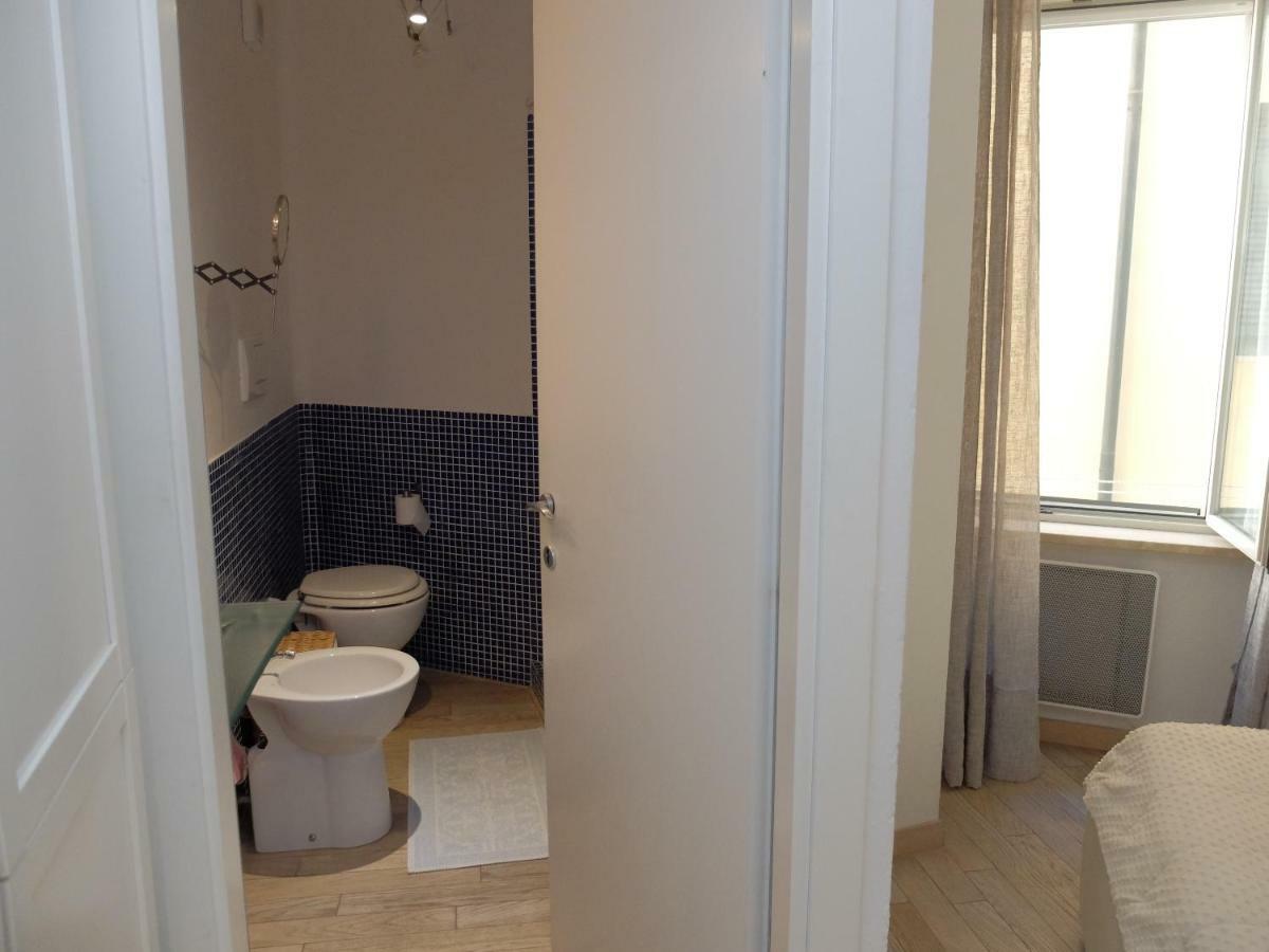 Little White House Apartment Порто Санто Стефано Екстериор снимка