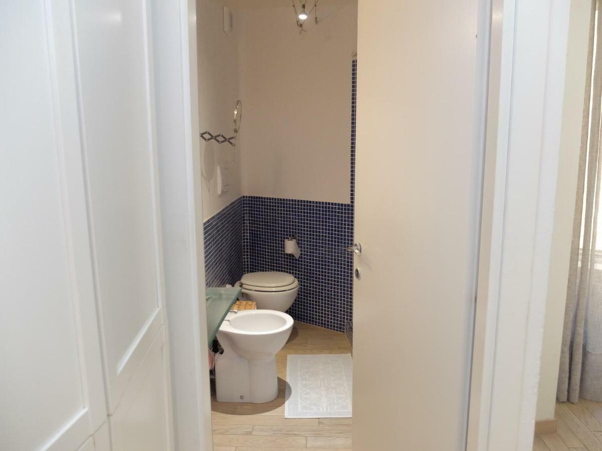 Little White House Apartment Порто Санто Стефано Екстериор снимка